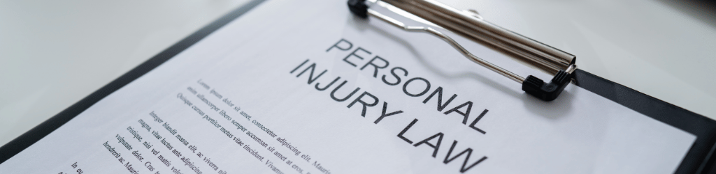 Clipboard with typed paper headed: Personal Injury Law"