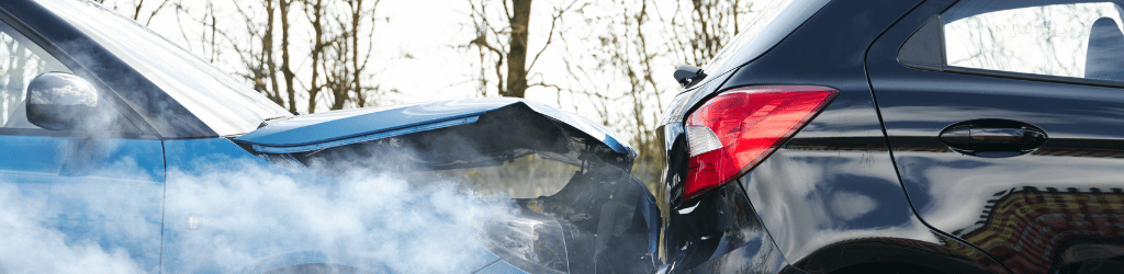 Two Damaged Cars Involved in Road Traffic Accident