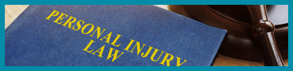 A blue book titled 'Personal Injury Law'